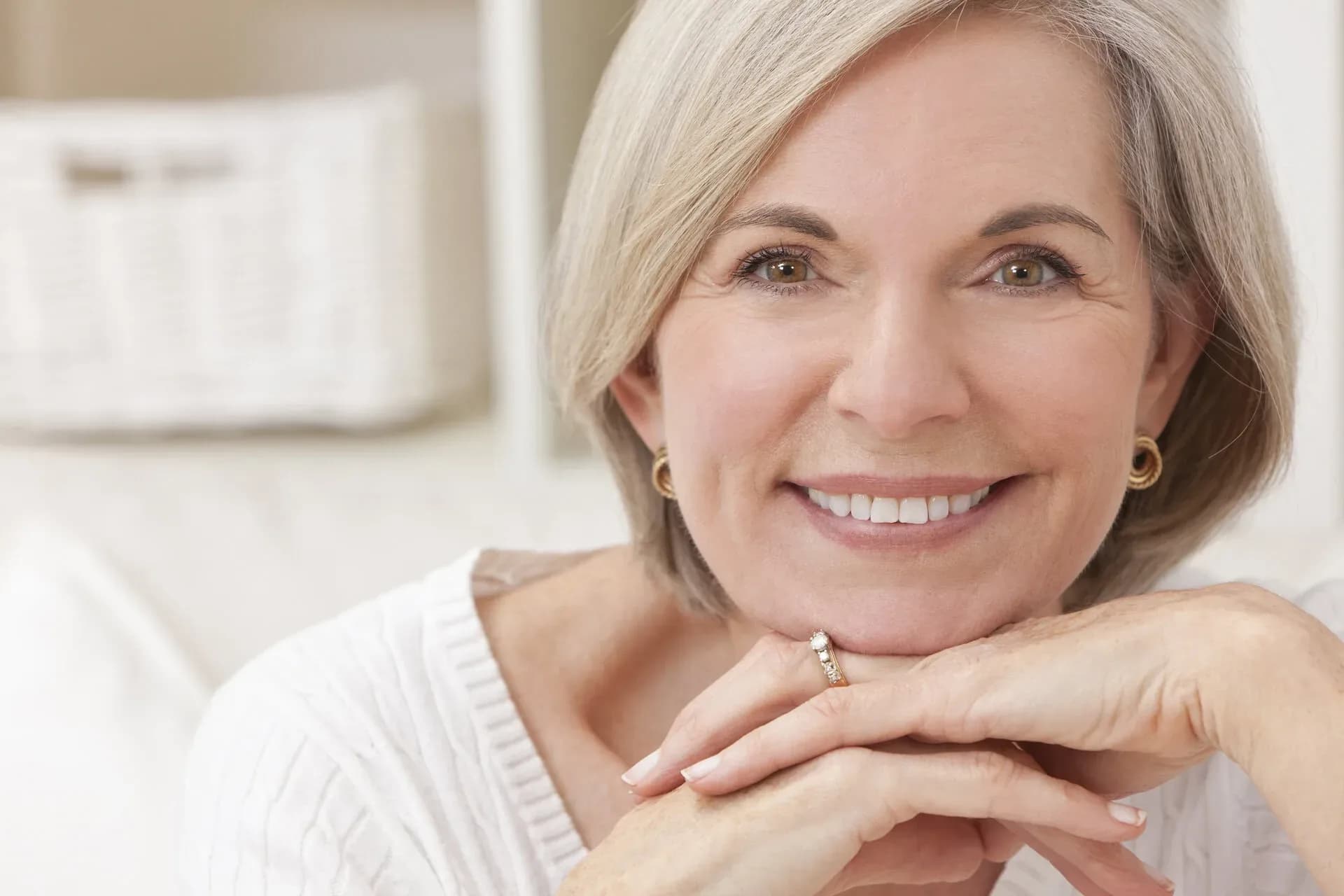 Elegant senior woman smiling and relaxed - All-on-4 dental implants at Neola Dental in Minneola, FL
