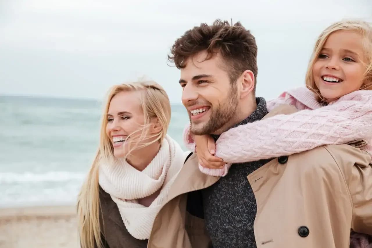 Family smiling at Neola Dental in Minneola, FL